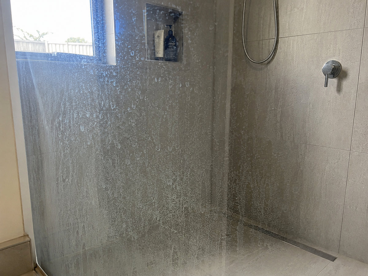 Shower screen with cloudy glass after six years